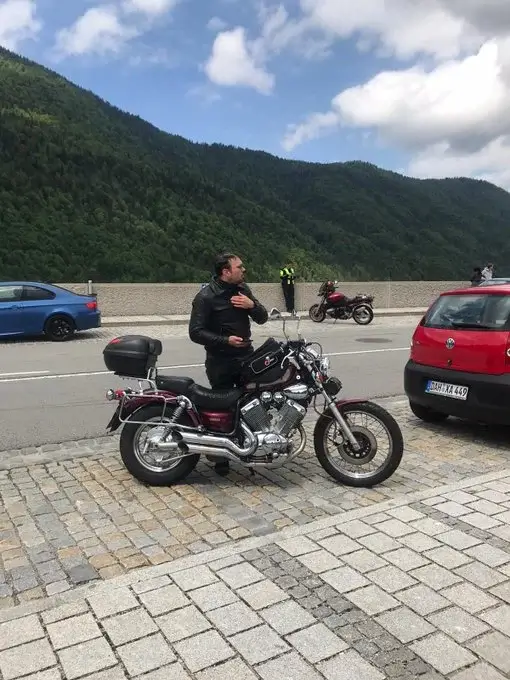 Travel Vlogger with his motorcycle